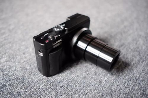 松下摄像机如何安装长焦镜头（松下长焦相机dcfz2500）